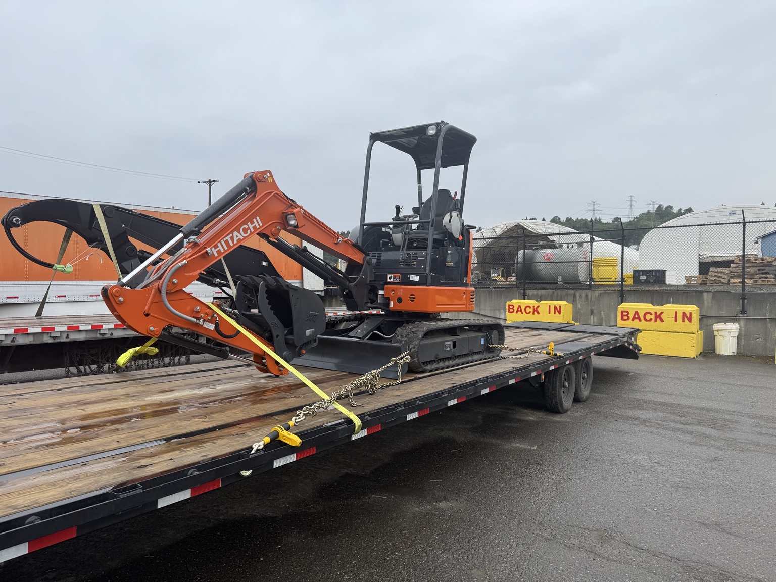 Mini excavator being transported